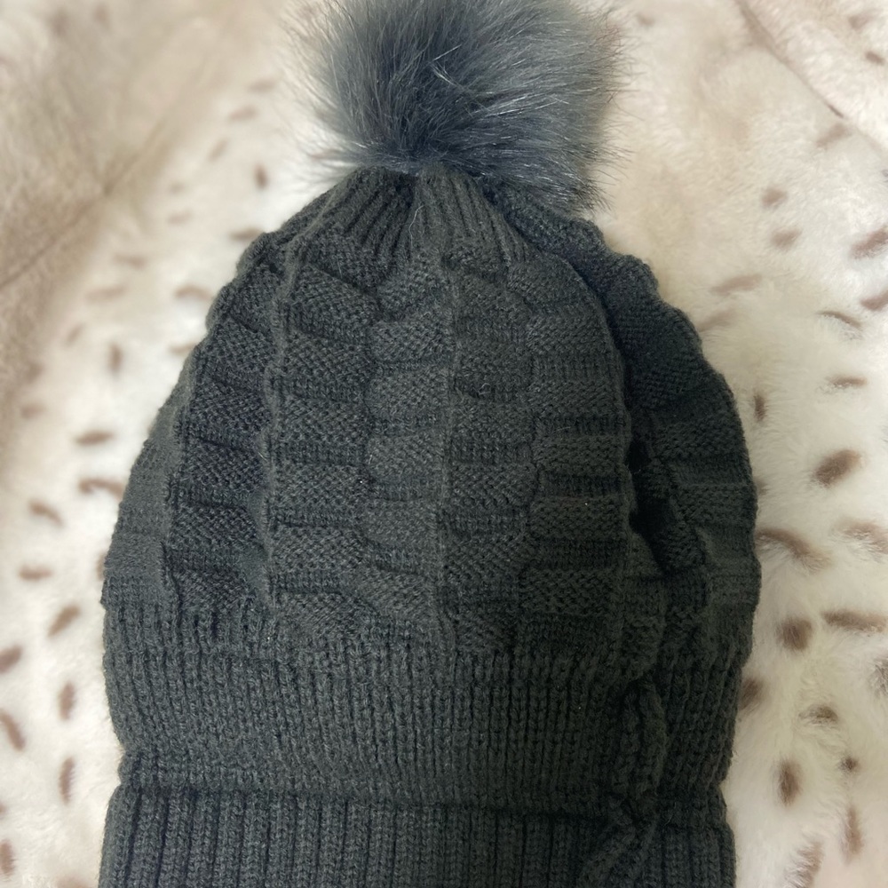 Grey knitted fluffy winter beanie